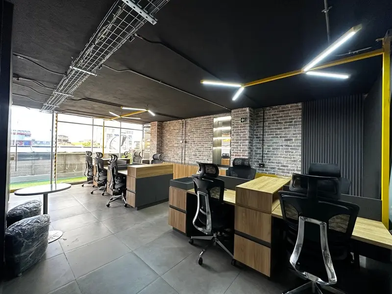 Fotografía de obra terminada: área de trabajo. Oficinas con zona recreativa en Bogotá, Decord Design