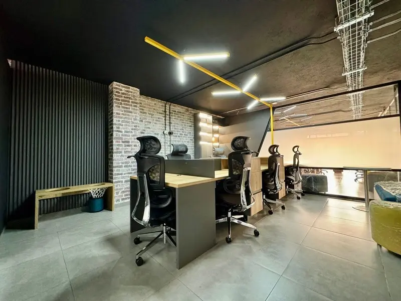 Fotografía de obra terminada: área de trabajo. Oficinas con zona recreativa en Bogotá, Decord Design